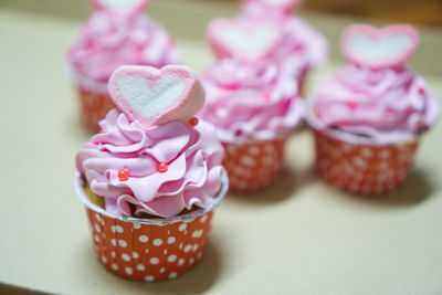 Close-up of cupcakes on table