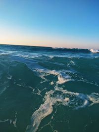 Scenic view of sea against clear sky