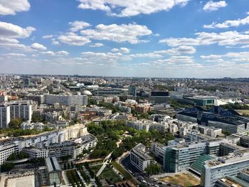 Aerial view of buildings against sky in paris 