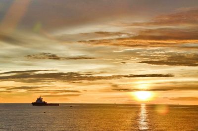 Scenic view of sea at sunset