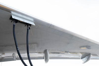 Low angle view of airplane against sky