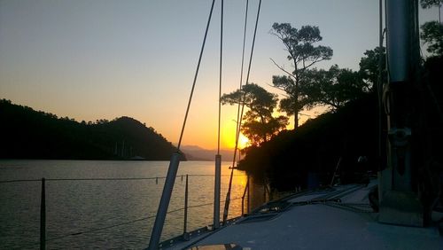 Scenic view of river at sunset