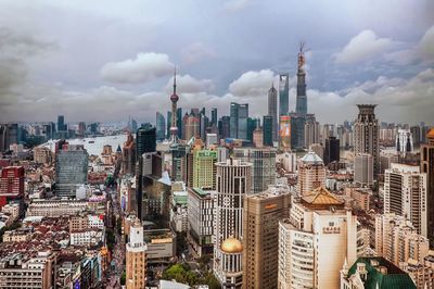 View of city against cloudy sky