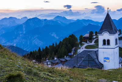 Building against mountains and sky