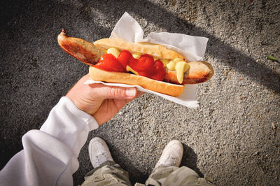 Close-up of hand holding food