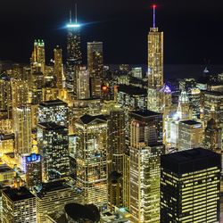 High angle view of glowing cityscape at night