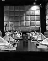 Empty chairs and tables in restaurant