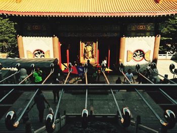 Woman standing against wall