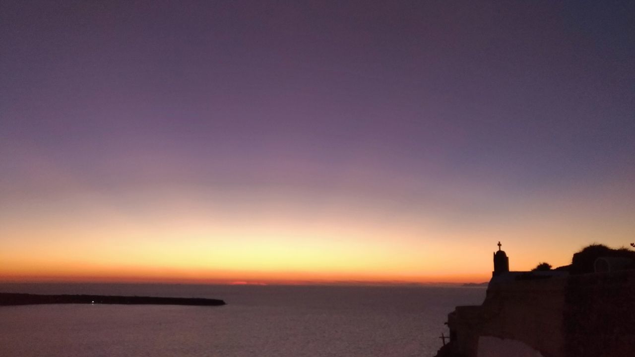 SCENIC VIEW OF SEA DURING SUNSET