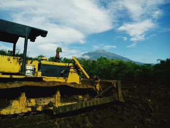 Construction site on field against sky