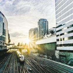 View of buildings against cloudy sky