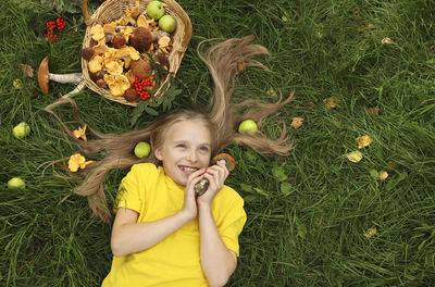 Portrait of smiling girl on land