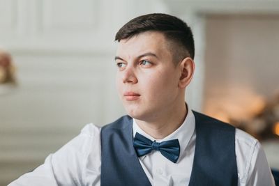 Portrait of young man looking away