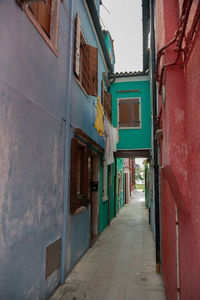 Narrow alley amidst buildings