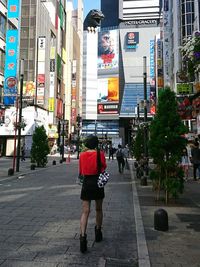 Full length of man on street in city