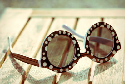 Close-up of sunglasses on table