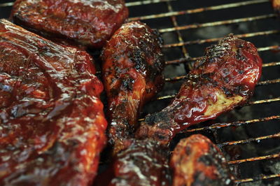 Close-up of meat on barbecue grill