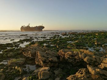 Scenic view of sea against clear sky