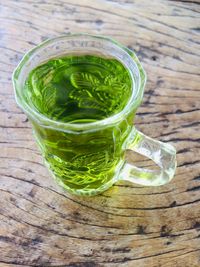 Close-up of tea in glass on table