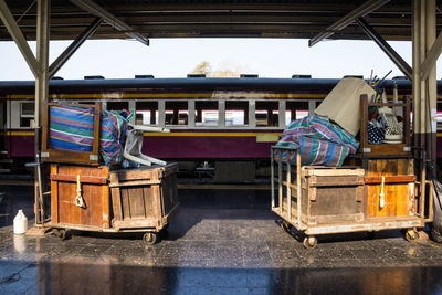 Baggage in the train station. wooden box and bag. travel by train. train station