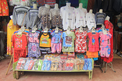 Multi colored displayed for sale at market stall
