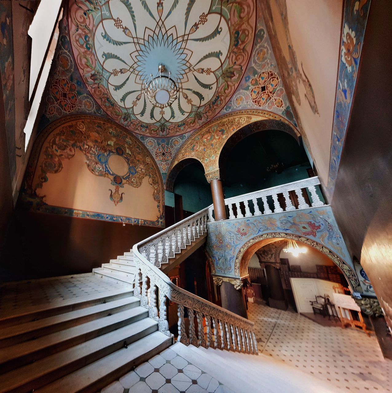 LOW ANGLE VIEW OF STEPS IN HISTORIC BUILDING