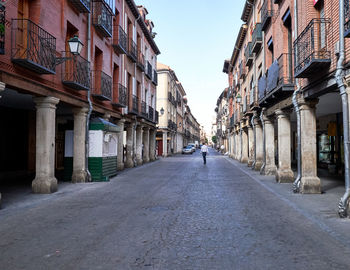 Man walking on street in town