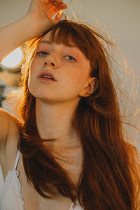 Portrait of young woman with eyes closed