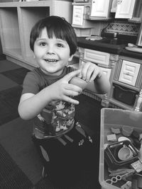 Portrait of smiling boy at home