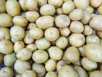 Full frame shot of onions for sale at market stall