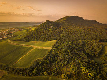 Scenic view of landscape against sky during sunset