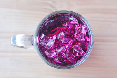 High angle view of drink in glass on table