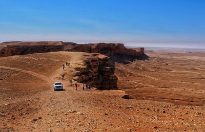 Rock formations in desert against sky