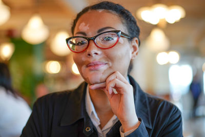 Portrait of woman wearing eyeglasses