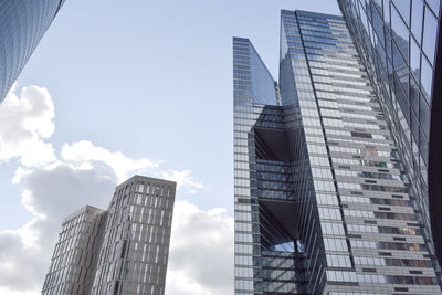 Low angle view of modern buildings against sky