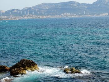 Scenic view of sea against clear sky