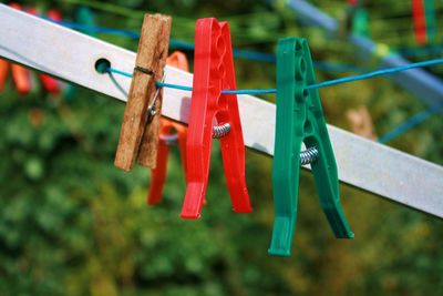 Close-up of colorful clothespin on rope