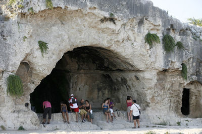 Group of people in cave