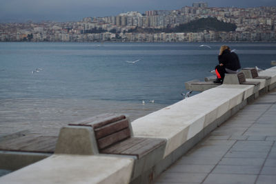 Rear view of woman in sea