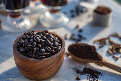 Coffee beans, wooden spoon, making coffee at home