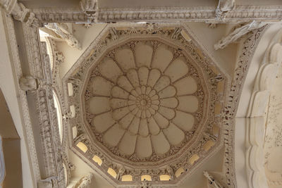 Low angle view of ornate ceiling in historic building