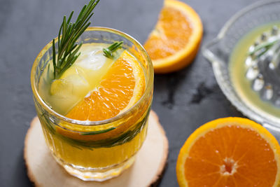 Close-up of orange juice in glass on table