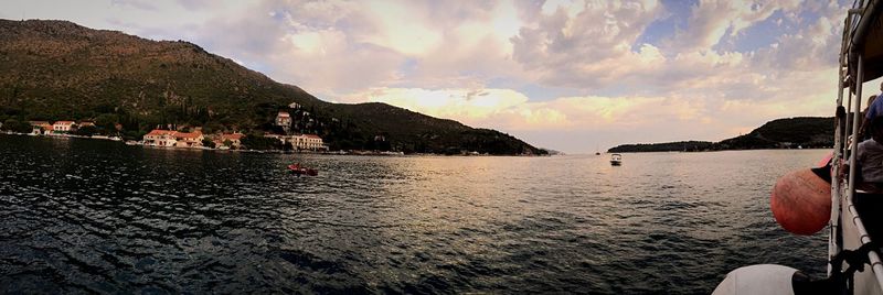 Scenic view of sea against cloudy sky