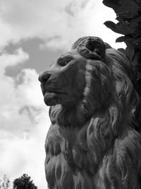 Low angle view of statue against sky