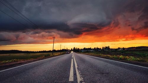 Road against sky during sunset