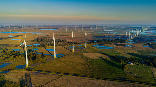 High angle view of field against sky during sunset
