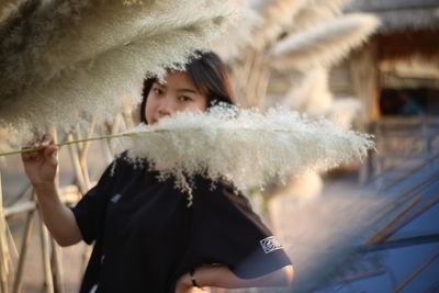 Midsection of woman holding ice cream