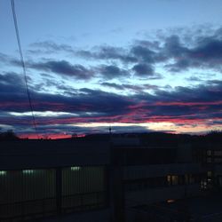 Low angle view of cloudy sky at sunset