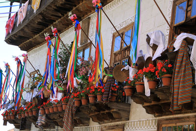 Low angle view of decorations hanging in building
