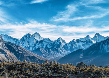 Scenic view of snowcapped mountains against sky